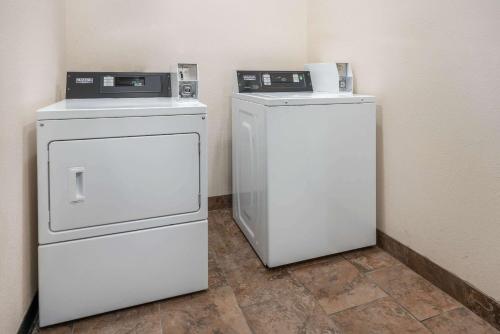 two appliances sitting next to each other in a room at La Quinta by Wyndham Belgrade - Bozeman Airport in Belgrade