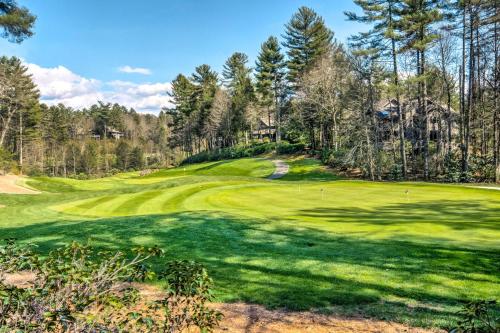a view of a golf green with trees in the background at Luxury Sapphire Cabin Mtn Views and Resort Access! in Sapphire