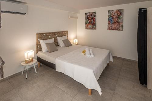 Llit o llits en una habitació de ILET JADE