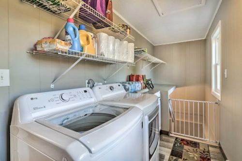 a washer and dryer in a small laundry room at Welcoming Boone Getaway Near Hiking and Skiing! in Boone