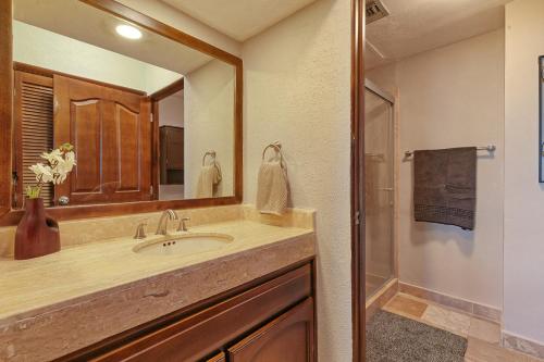 a bathroom with a sink and a mirror at Marina Pinacate B-201 in Puerto Peñasco