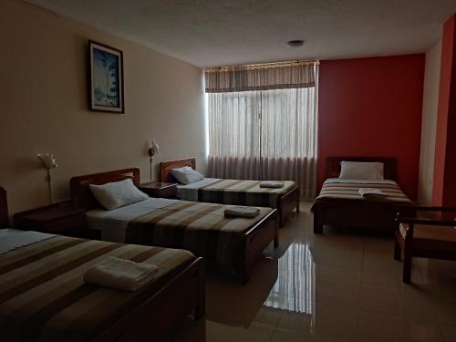 Postel nebo postele na pokoji v ubytování Hotel Diana Real