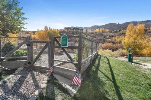 a wooden gate with an american flag on it at Beaver Creek 2 Bed 2 Bath Condo 1 MIN Walk to Elk Lot in Avon