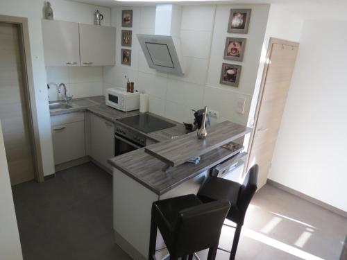 Kuchyň nebo kuchyňský kout v ubytování Spira House