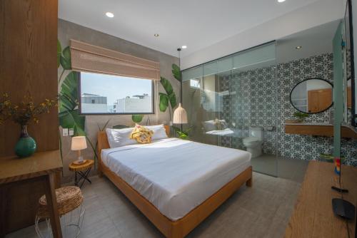 Postel nebo postele na pokoji v ubytování Shoho Hotel Nha Trang