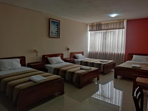 Postel nebo postele na pokoji v ubytování Hotel Diana Real