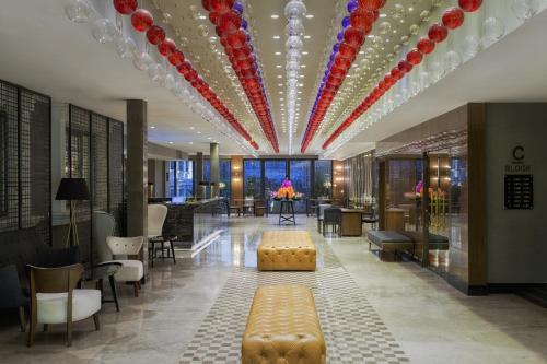 a hotel lobby with a red and white ceiling at Sura Hagia Sophia Hotel in Istanbul