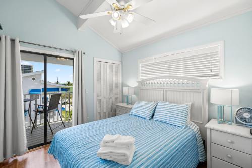 Ένα ή περισσότερα κρεβάτια σε δωμάτιο στο Sunset Beach House