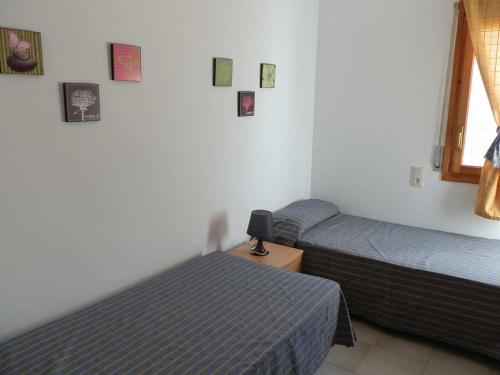 Posteľ alebo postele v izbe v ubytovaní Casa cerca del mar, wifi gratuito, aire opcional, piscina, mascotas aceptadas, playa para perros - ES-184-6