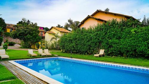 Bazén v ubytování Acasa Diamantina - O aconchego em meio a natureza nebo v jeho okolí