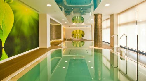 a pool in the middle of a room at Kipriotis Panorama Hotel & Suites in Kos Town