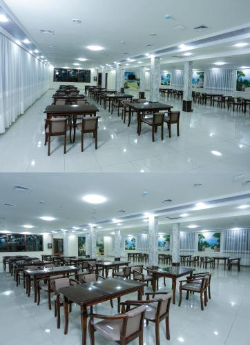 Restaurant ou autre lieu de restauration dans l'établissement Khan Palace Hotel