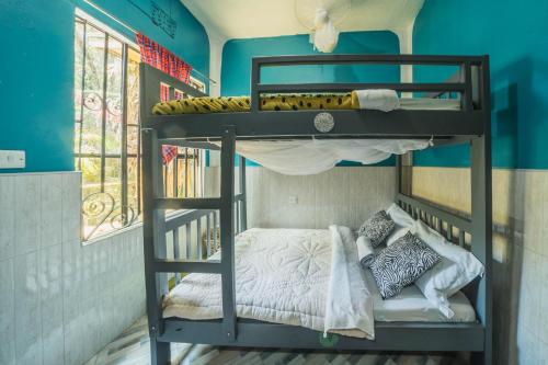 Banana Farm Eco Hostelにあるベッド