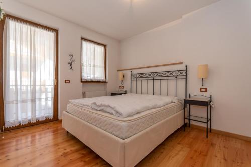 Una cama o camas en una habitación de Residence Molin