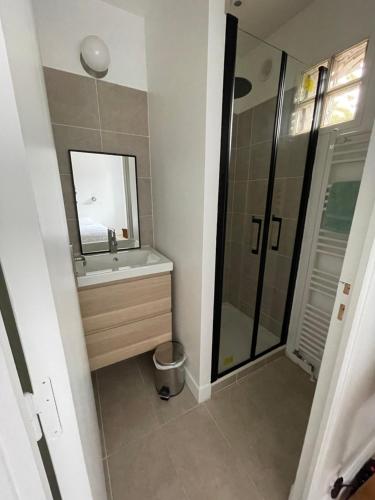 Kúpeľňa v ubytovaní Max3, T2 en duplex, Bord de mer
