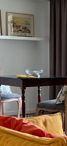 a dining room table with a bowl on top of it at Belvedere Boutique - Adults only in Funchal