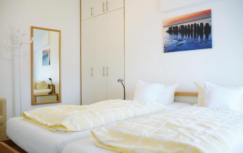 Postel nebo postele na pokoji v ubytování Ferienhaus Pauls Ferienhaus Pauls, Whg 09