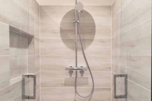 Ένα μπάνιο στο Kustappartementenkatwijk 2F