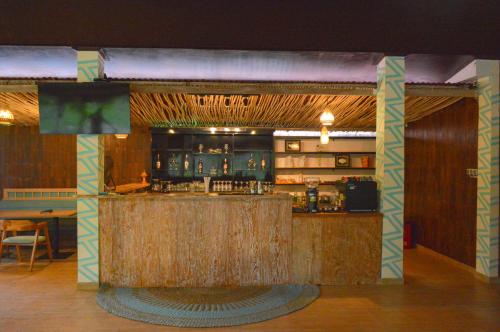 a bar in a restaurant with a counter at The MG Villa & SPA in Nusa Penida