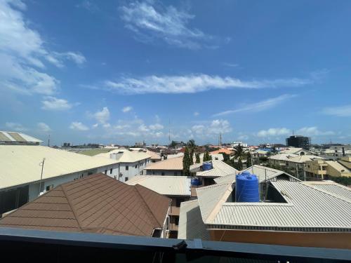 a view of a city with roofs and buildings at Romel Terraces in Lagos