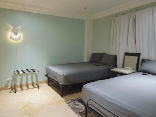 Postel nebo postele na pokoji v ubytování Azure Rosarito Rental at Olas