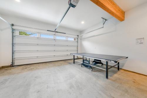 a garage with a ping pong table in it at Seaside Ocean Getaway in Seaside
