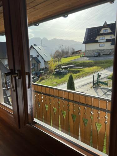 a view from a window with a view of a street at Janickowa Ostoja - Noclegi w Zakopanem in Zakopane