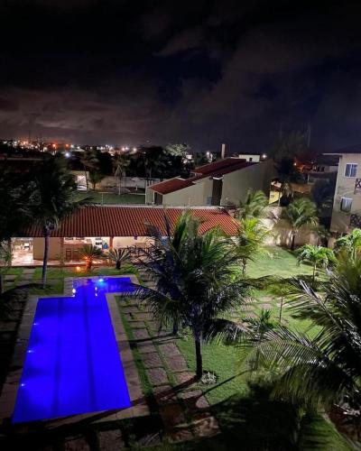 Bazén v ubytování Residencial Nova Taíba CE com vista para o mar nebo v jeho okolí