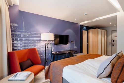 Ένα ή περισσότερα κρεβάτια σε δωμάτιο στο Hotel Indigo Helsinki-Boulevard by IHG