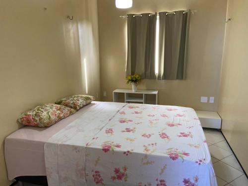 Łóżko lub łóżka w pokoju w obiekcie EDIFÍCIO PORTUGAL VILLAGE