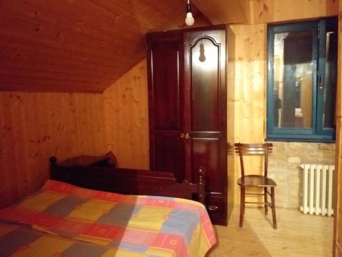 Una cama o camas en una habitación de Vikend kuća Fruška Gora