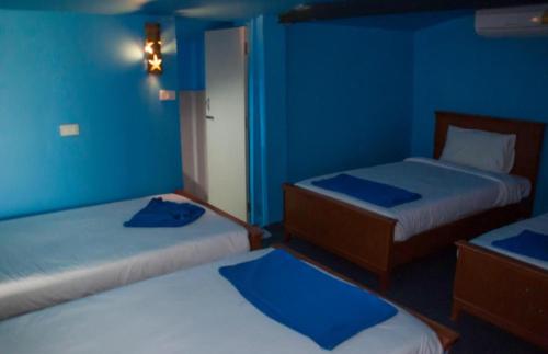 Katil atau katil-katil dalam bilik di The Lazy Bar and Guesthouse