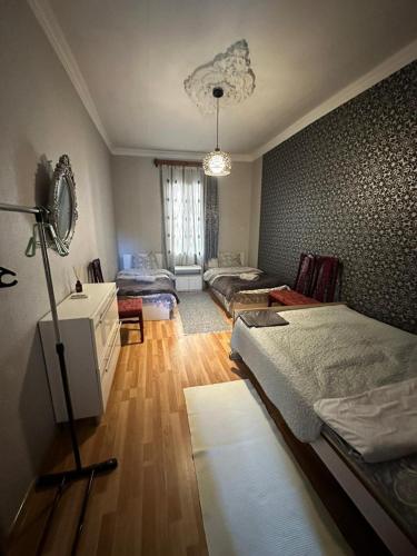 Llit o llits en una habitació de Guest house Amazon