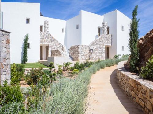 a view of the house from the garden at WHITE DONKEY BOUTIQUE Hotel in Chrani