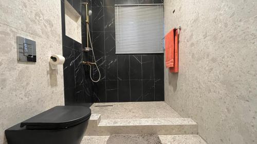 Ένα μπάνιο στο Mariaddo homes