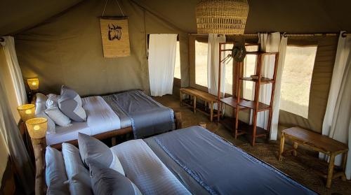 Voodi või voodid majutusasutuse Zawadi Camp toas