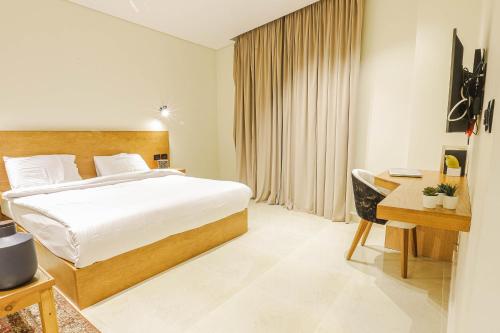 Ліжко або ліжка в номері NewCity Hotel & Suites