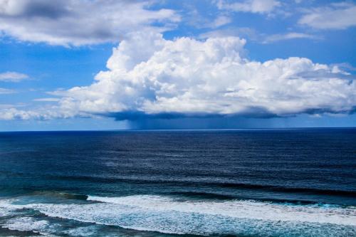 a storm approaching the ocean with at Sky Island Resort in Ponta Malongane