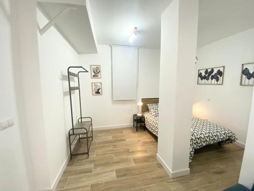 Postel nebo postele na pokoji v ubytování China Town Madrid 01