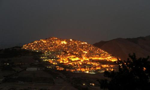 a view of a city lit up at night at Al Centro in Gangi