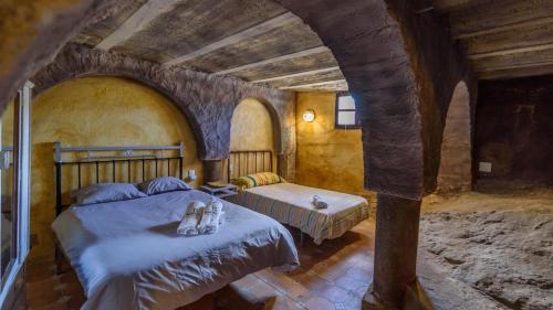 Postel nebo postele na pokoji v ubytování Ermita de las Eras Algarinejo by Ruralidays