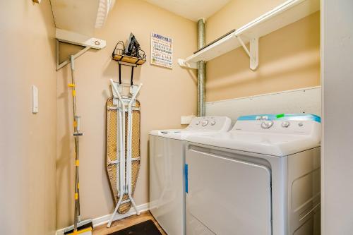 a laundry room with a washer and dryer at Saints Haven in Houston