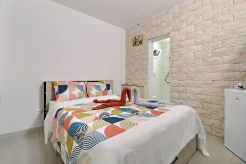 Posteľ alebo postele v izbe v ubytovaní Chambre cosy jo