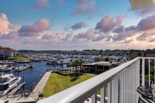 a view from a balcony of a marina at Holiday Inn Express North Myrtle Beach - Little River by IHG in Little River