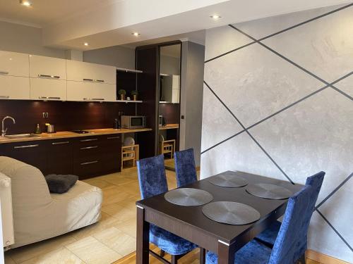 Kuchyňa alebo kuchynka v ubytovaní Apartament Słoneczny