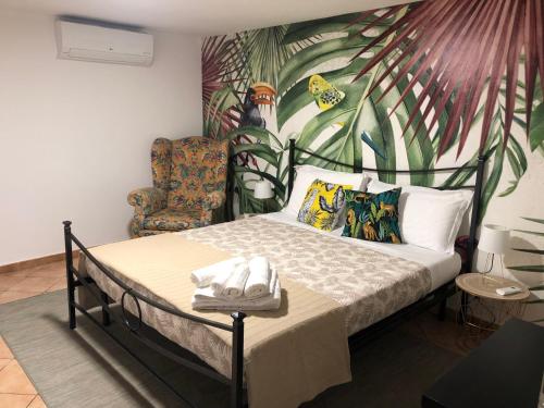 Ένα ή περισσότερα κρεβάτια σε δωμάτιο στο Narciso Katane suites