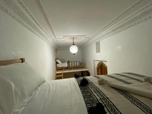 Postel nebo postele na pokoji v ubytování Hostel Capital