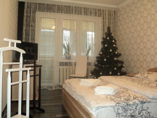 Ένα ή περισσότερα κρεβάτια σε δωμάτιο στο Apartment on Novaya Street 5