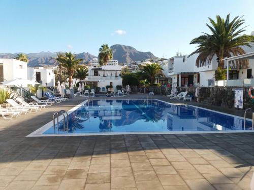 Swimmingpoolen hos eller tæt på APARTAMENTO BUNGAMERICA n112