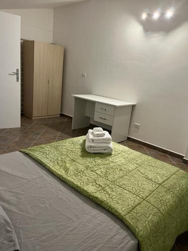 Ένα ή περισσότερα κρεβάτια σε δωμάτιο στο Casa vacanze open space
